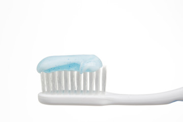 Closeup of a toothbrush with toothpaste.