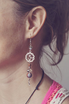 Beautiful earring with om symbol and ethno beads