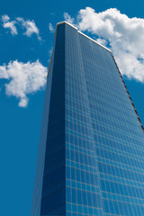 Multi-storey business center on blue sky background