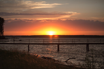 Fototapeta premium Wooden pier at sunset