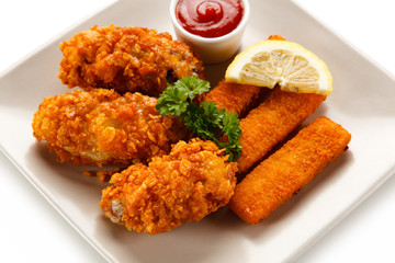 Fried fish fingers with chicken nuggets