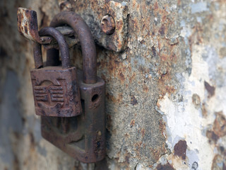 Close-up Lock on rusty iron door