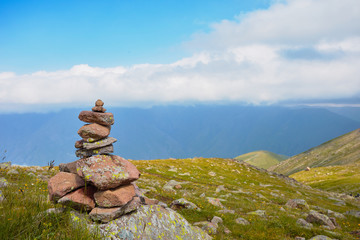 Mountain landscape, stone towers, summer in the Caucasus