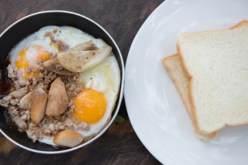 Easy breakfast. Egg pan and breads.