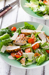 Grilled chicken salad with tamatoes and parmesan cheese