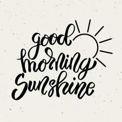 Good morning sunshine. Hand drawn lettering phrase isolated on white background.