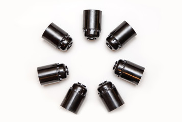 Set of plastic and ceramic electric cartriges for bulb isolated on white. Top view