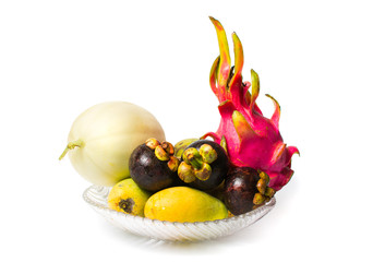 Various tropical fruit isolated on white