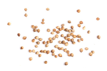 Coriander seeds isolated on white background top view