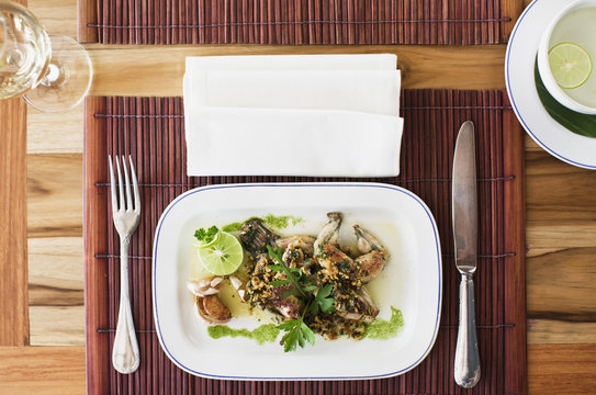 Pan-fried Frog Legs, Provencale Style (garlic, butter, parsley). Luang Prabang, Laos.