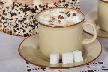 coffee with whipped cream and chocolate and coffee with cream cake