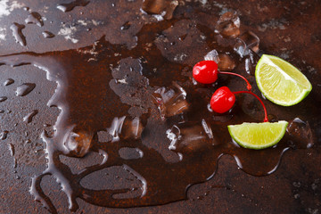 Lime, cherry and melting ice background