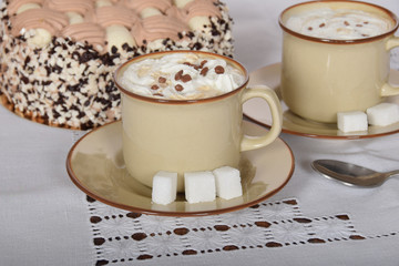 coffee with whipped cream and chocolate and coffee with cream cake