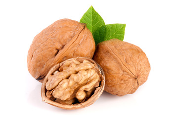 Walnuts with leaf isolated on white background