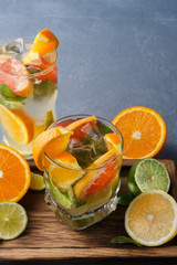 Colorful summer background with citrus drinks and fruits