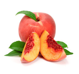 Peach and slice with a green leaf isolated on white background