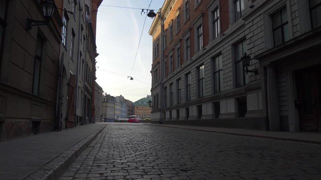 POV. Empty old street in Riga, Latvia.