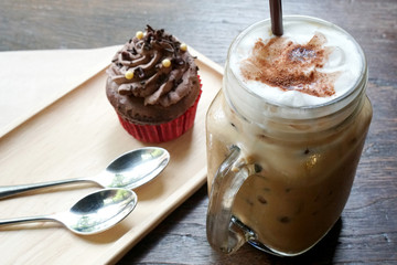 Chocolate cupcake with ice coffee