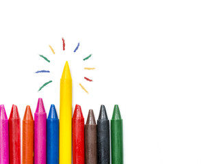 colorful oil pastel crayons on white background, Stand out concept