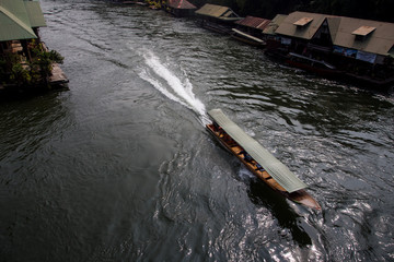 Boat getting through the river Kwai in Sai Yok national park, Kanchanaburi, Thailand