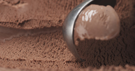 closeup scooping chocolate ice cream