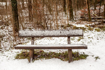 an Bench in snow