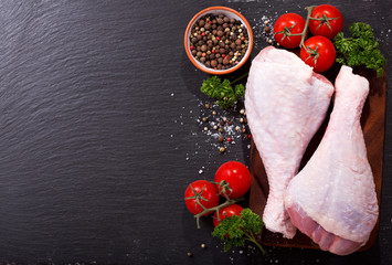fresh turkey legs with ingredients for cooking © Nitr