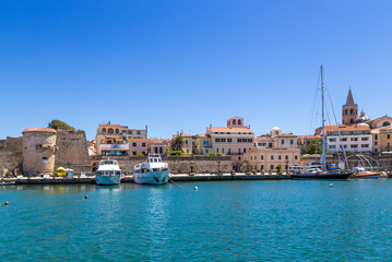 Alghero, Sardinia, Italy. Port on the background of the fortress