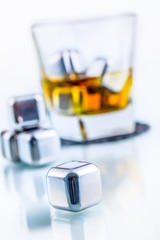 Stainless steel fake ice cubes with whiskey glass