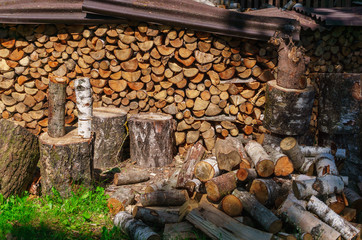 A pile of firewood prepared for the fireplace.