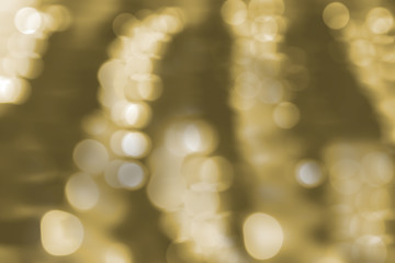 The rouond bokeh and gold color blurry background