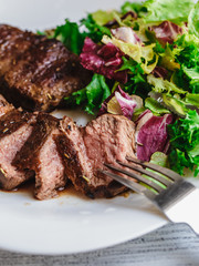 Steak with salad
