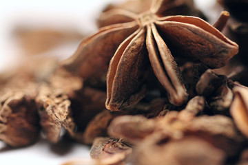 Pile of star anise fruits and seeds