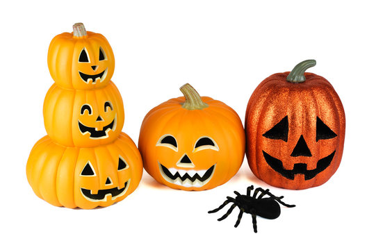 Halloween pumpkin lantern and spider isolated on white background