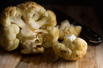 Baked cauliflower on a cutting board