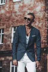laughing man in a suit
