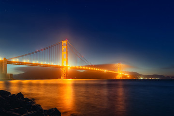 Panorama photo of Golden Gate Bridge at night time, San Francisco