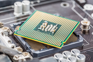 CPU processor installation close up in the motherboard