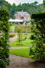 Fototapeta na wymiar Garden and country house in the summer