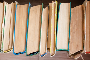 Top view of old books background texture