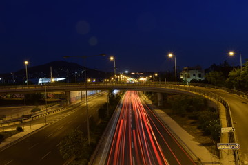 Long exposure image with beautiful light trails on an Athens road.