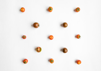 Cherry tomatoes pattern in a square on white background. Flat lay, top view