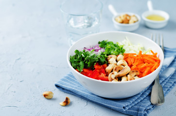 Cabbage carrot red bell pepper cashews salad