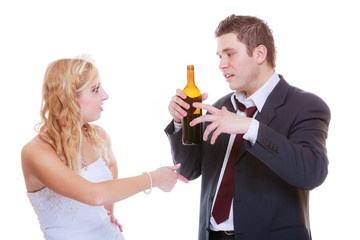Bride having argument with drunk alcoholic groom