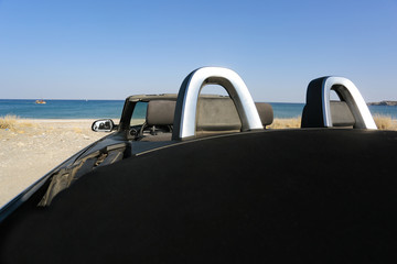 Fototapeta na wymiar summer car on beach and landscape of sea 