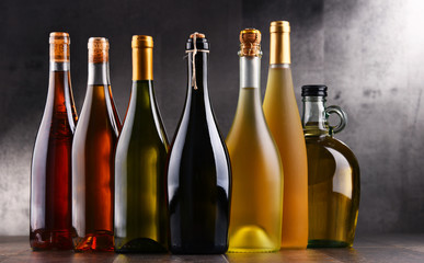 Composition with bottles different sorts of wine
