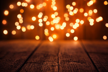 Christmas Bokeh background with empty wooden table 
