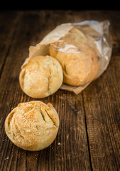 Fresh made Rolls (German style) on a rustic background