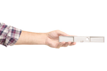 Fototapeta premium Level of construction in male hands