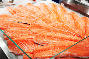 Salmon on cooled market display, toned
